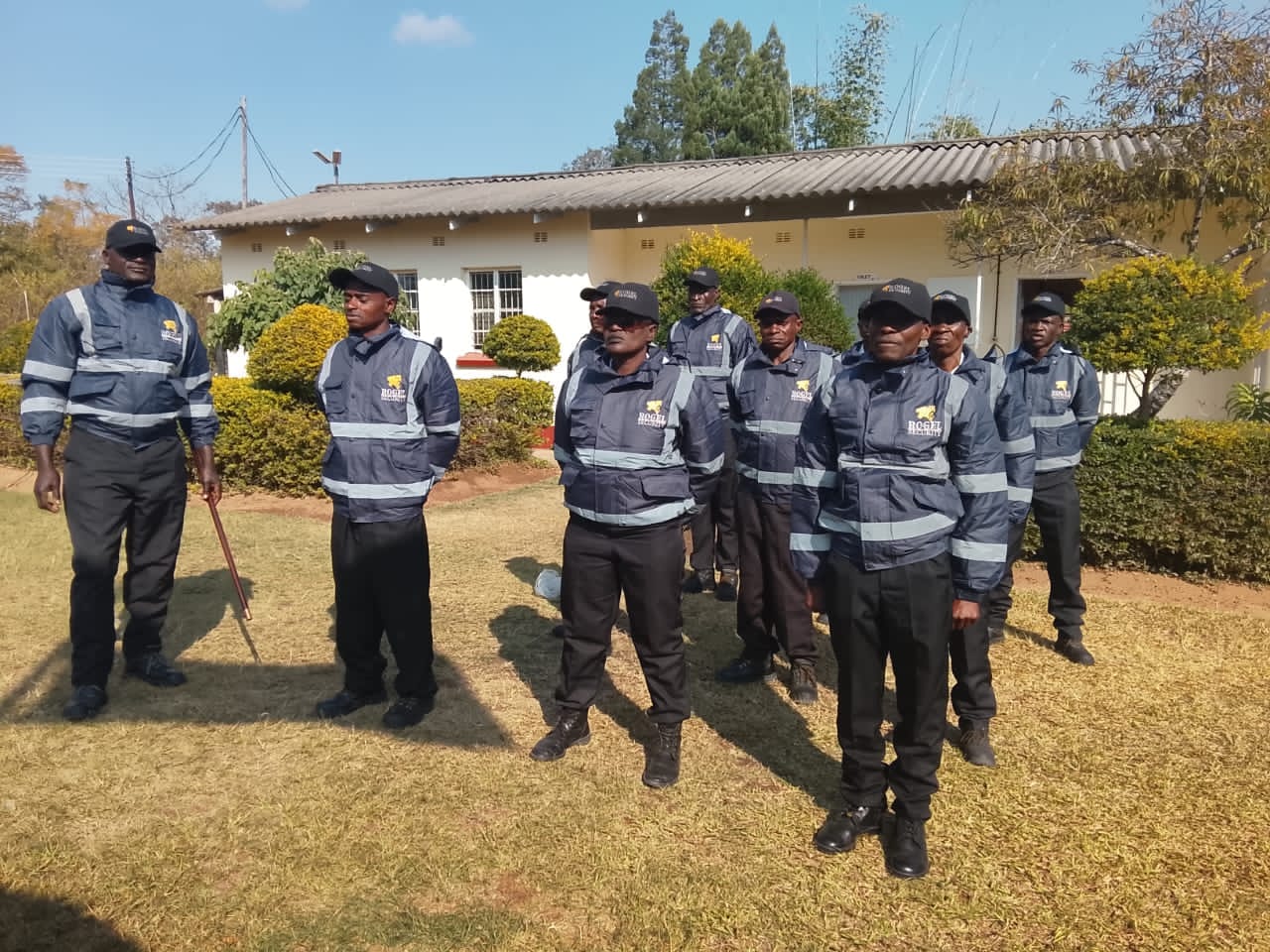 Rogel Security guards in reflective jackets during outdoor deployment